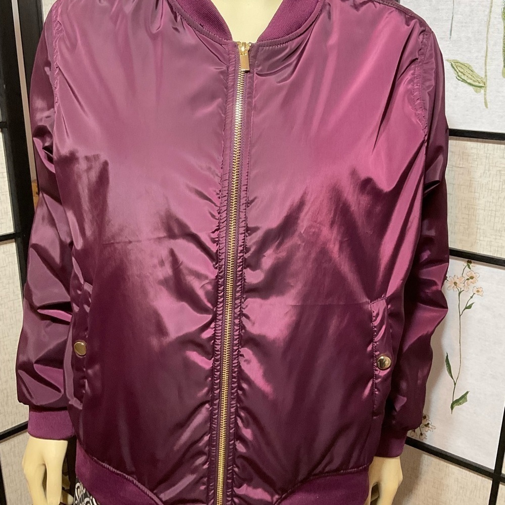 IMAN Windbreaker with Animal Print Lining.